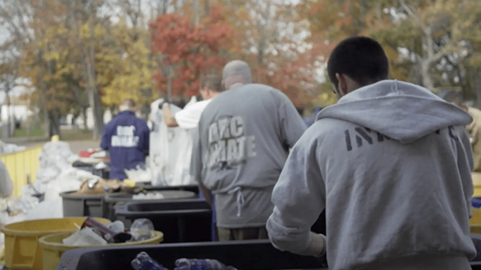 incarcerated men sorting recyclables 