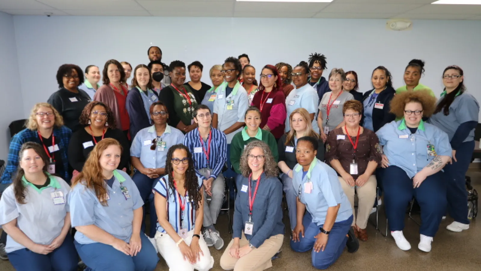 Large group of OSU faculty and incarcerated students pose for a photo during OPEEP's May 2024 instructor training at the Ohio Reformatory for Women.