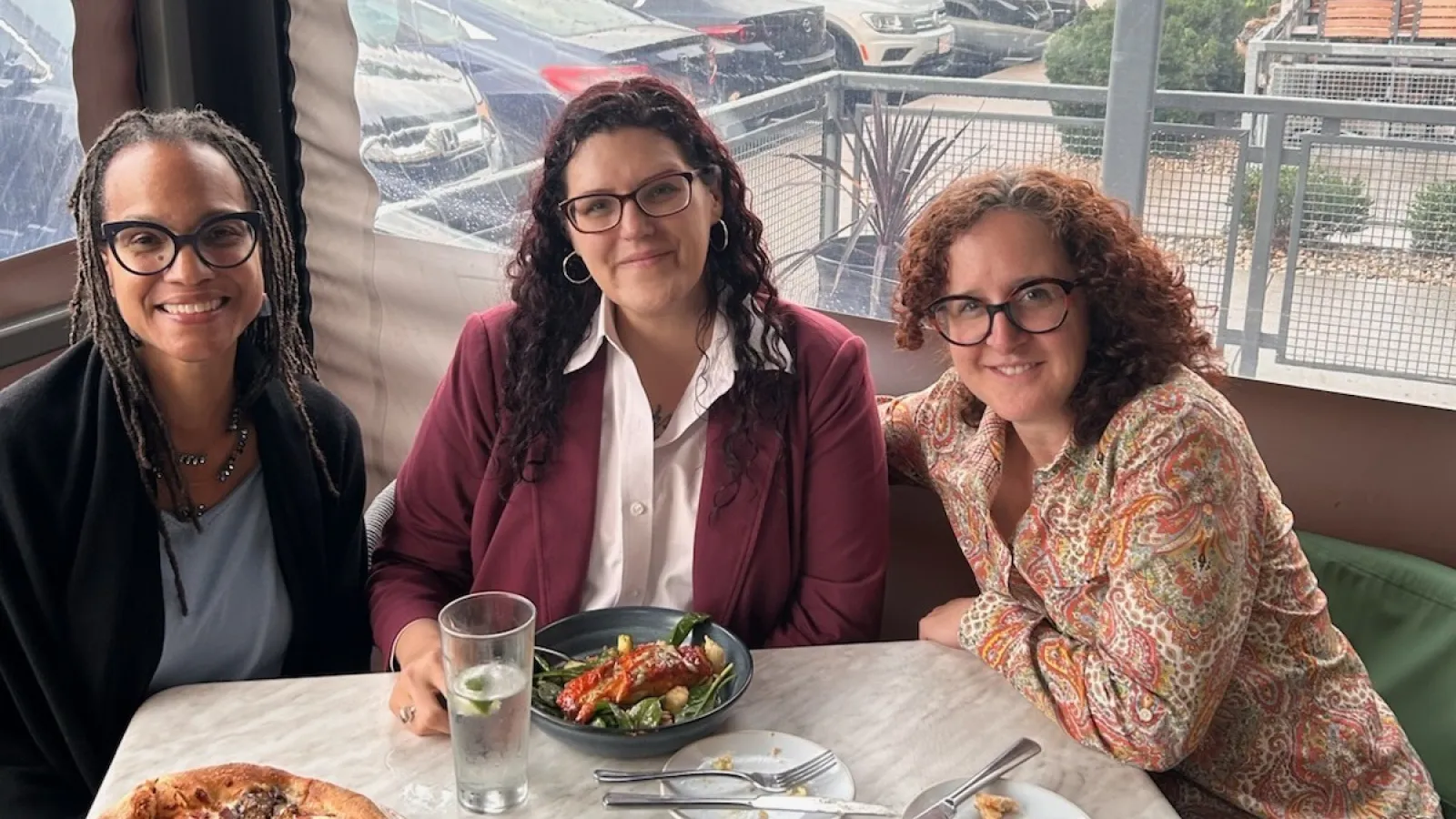 3 women sitting together