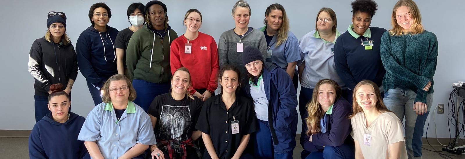 Group photo taken during the final class meeting of ART 5890: Drawing as Feminist Art taught by Professors Danie ReStack and Carmen Winant at the Ohio Reformatory for Women in Autumn 2022. 